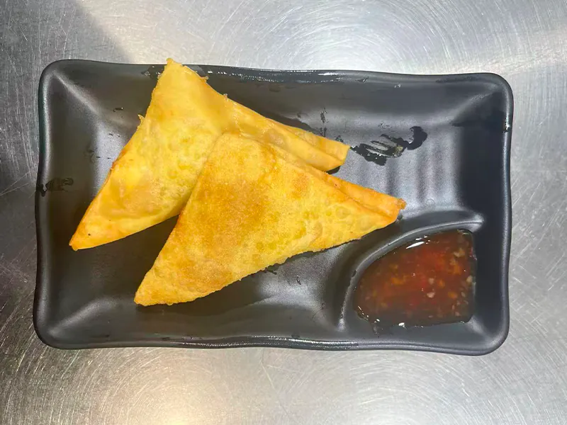 Crispy golden gyoza with savory filling at Toyama Sushi Steahouse, a Japanese Restaurant in Dacula