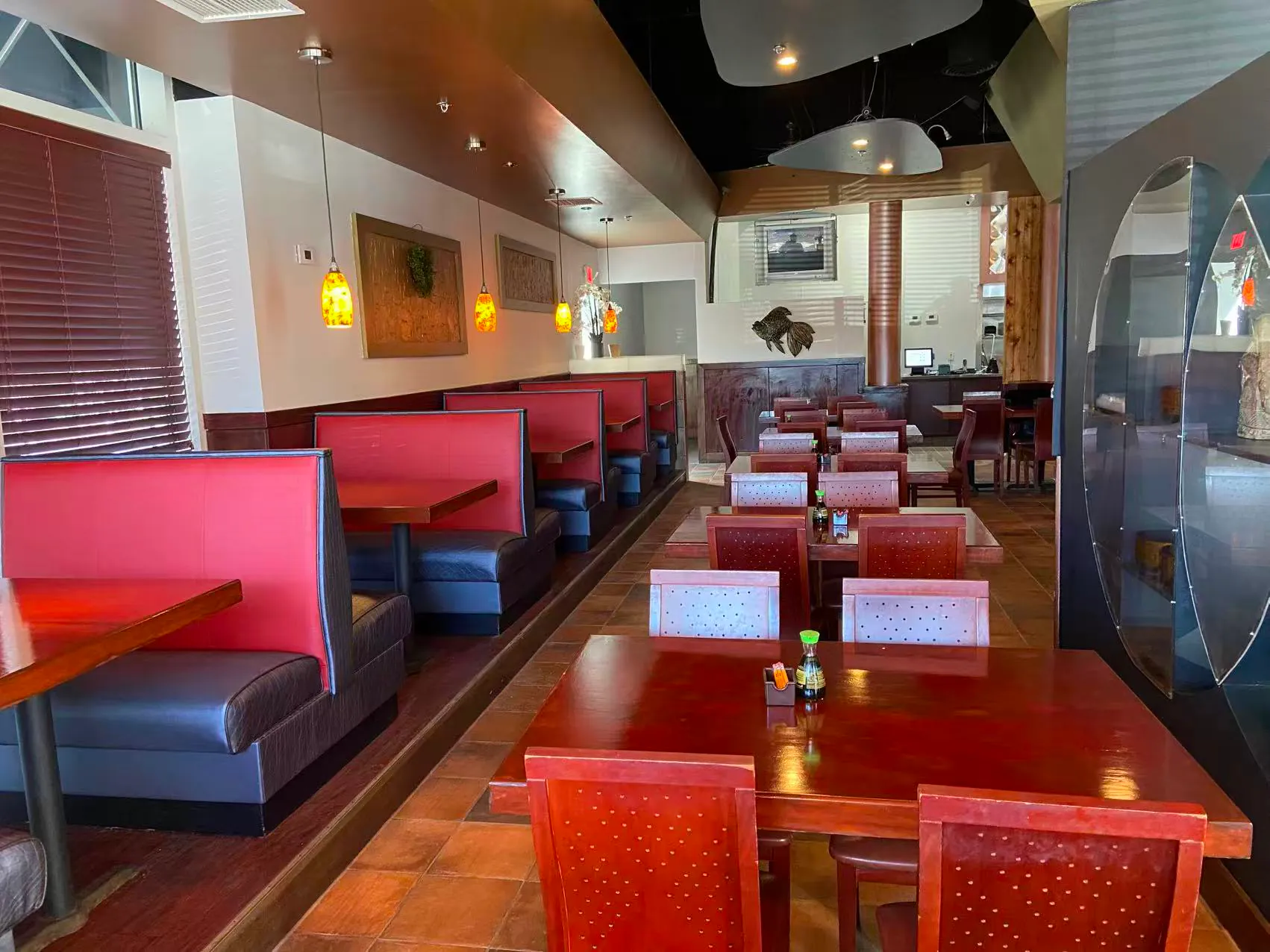 Spacious warm dining space with elegant decor at Toyama Sushi Steahouse, a Japanese Restaurant in Dacula